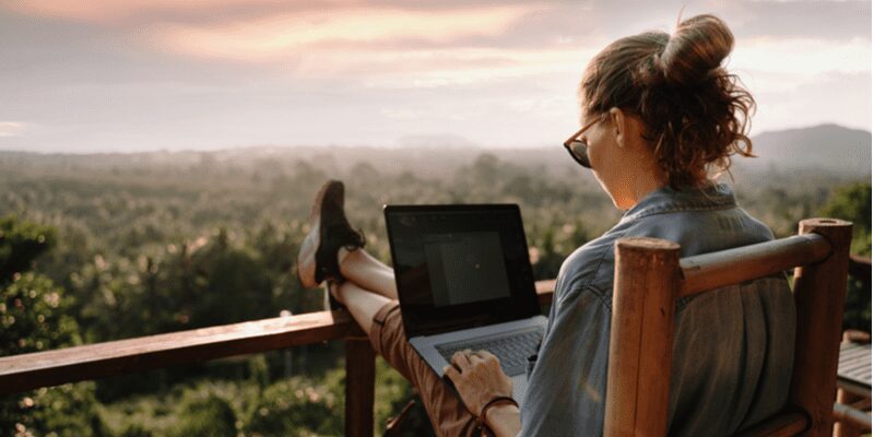 Image of a Woman working during vacation